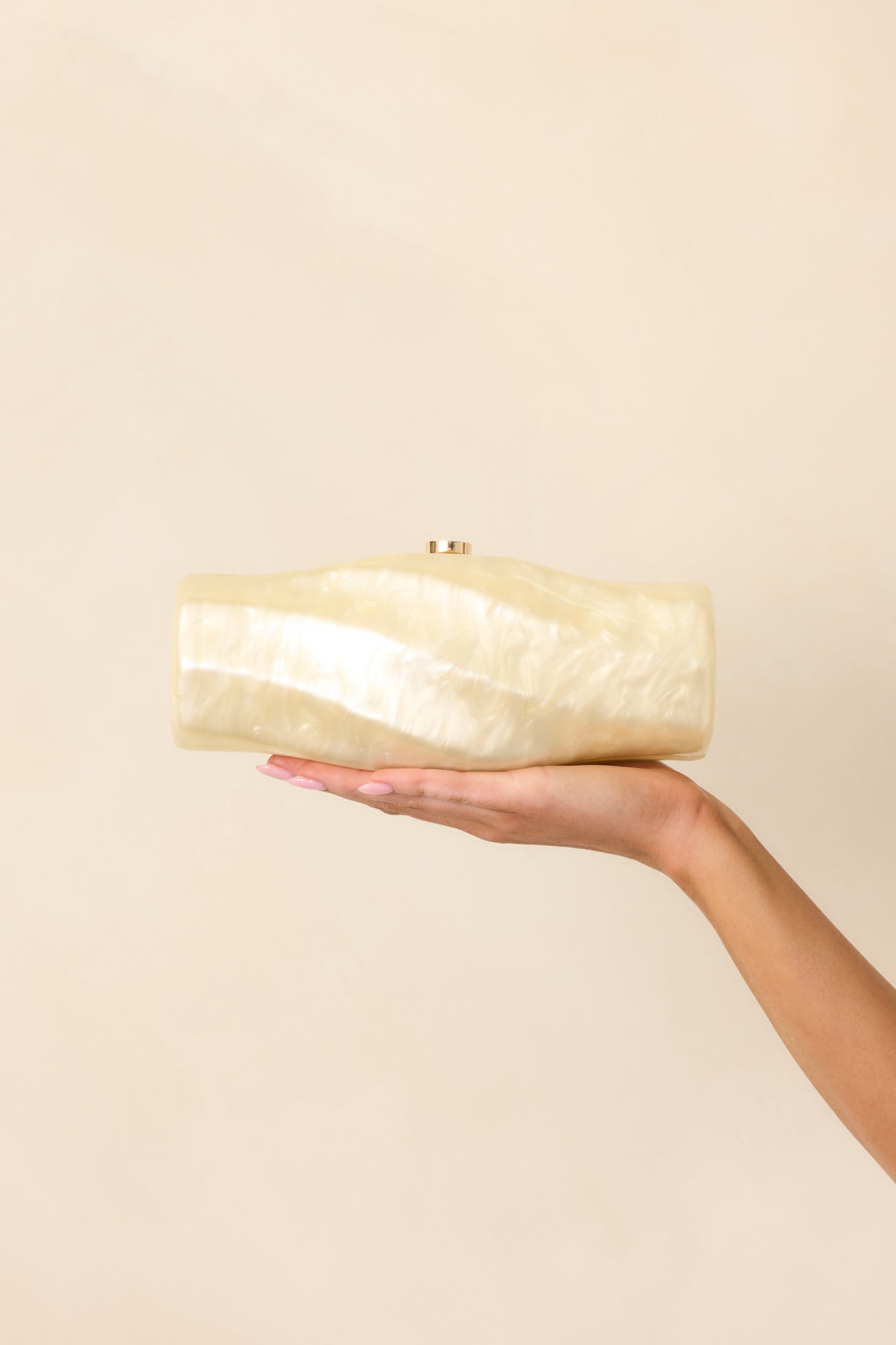 Got My Spark Back Champagne Pearlescent Spiral Clutch